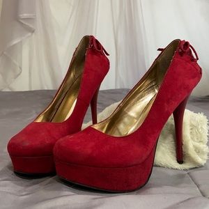 Red Platform heels with ankle accent